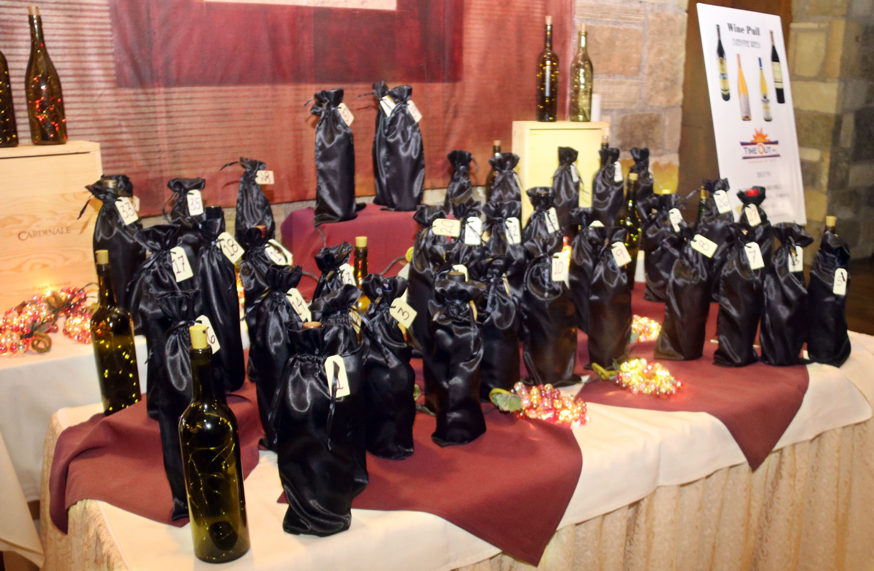 wine pull bottles used as a fundraiser for Time Out
